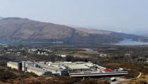 FILE PHOTO: A row of red-painted containers at the Lochaber aluminium smelter site, which is owned by companies controlled by Sanjeev Gupta's GFG Alliance, in Fort William, Scotland, Britain April 17, 2019. REUTERS/Russell Cheyne/File Photo