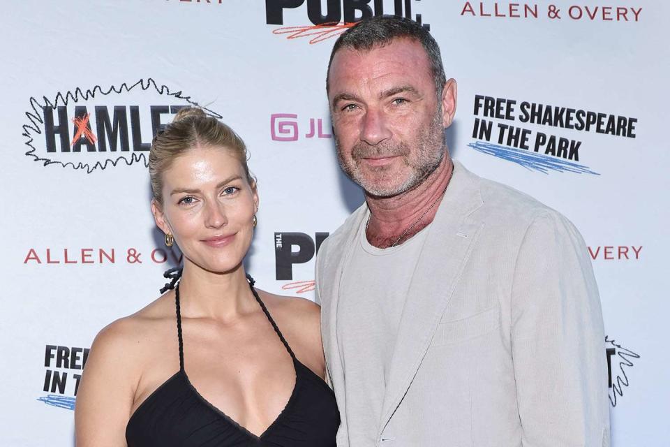 <p>Jamie McCarthy/Getty</p> Taylor Neisen and Liev Schreiber