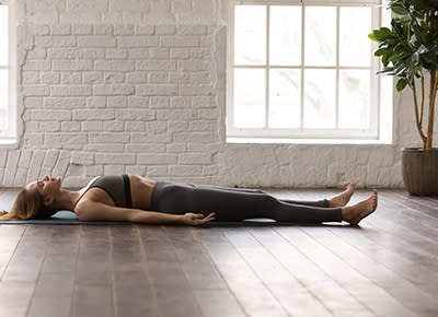 The Best Restorative Yoga Poses to Relieve Stress