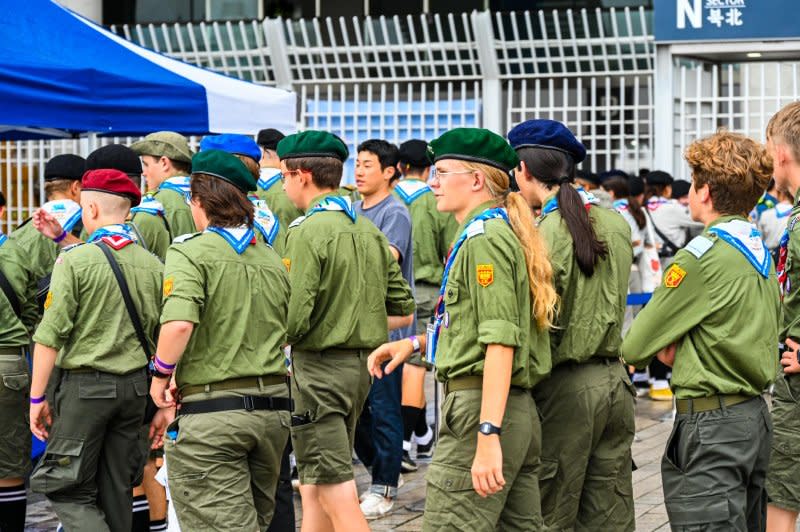 Scouts from Poland, which will host the next jamboree in 2027, arrive at the closing ceremony Friday. Photo by Thomas Maresca/UPI