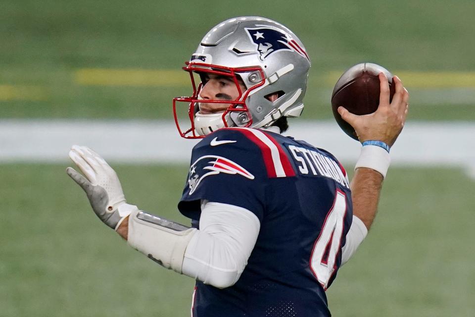 New England Patriots quarterback Jarrett Stidham drops back to pass in the second half of an NFL football game against the Buffalo Bills, Monday, in Foxborough, Mass.