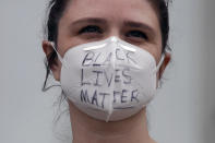 Annah Dominis wears a face mask with Black Lives Matter written on it, in San Francisco, Saturday, May 30, 2020,.at a protest over the Memorial Day death of George Floyd. Floyd was a black man who was killed in police custody in Minneapolis on May 25.. (AP Photo/Jeff Chiu)