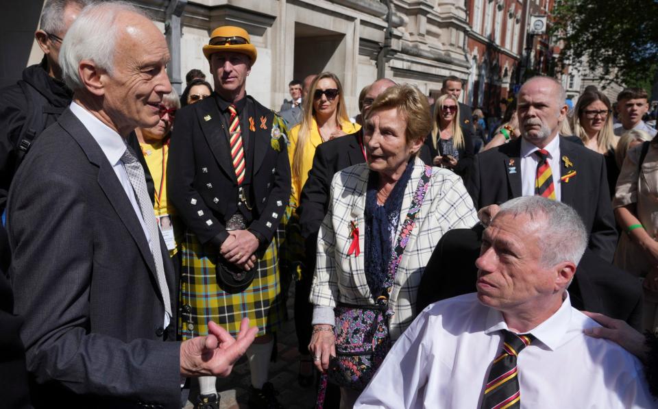 Sir Brian Langstaff, chairman of the Infected Blood Inquiry, meets victims and campaigners after the publication of the report