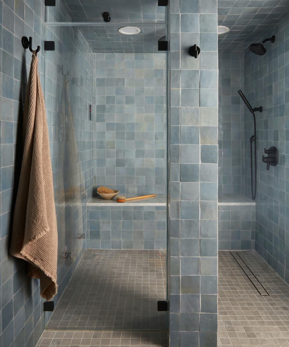 Dusty blue tiled bathroom