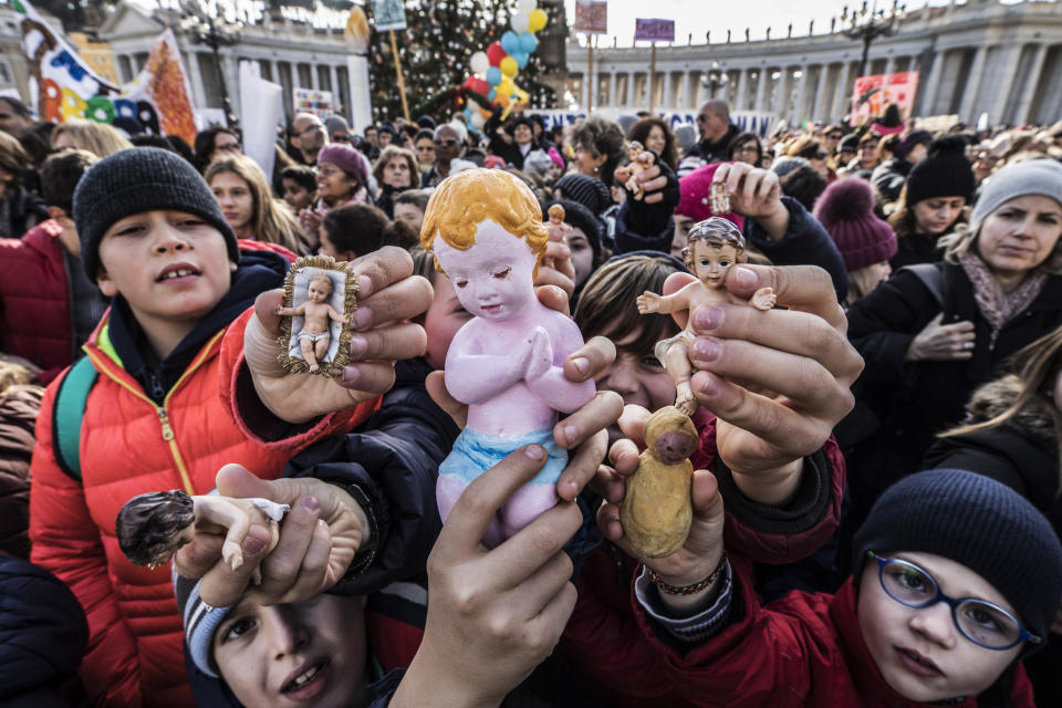 Following a custom started by the late Pope John Paul II, Pope Francis blessed Nativity figurines brought by pilgrims on Dec.17, 2017 at the Vatican. (Photo: Alessandra Benedetti - Corbis via Getty Images)