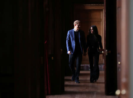 Prince Harry and Meghan Markle attend a reception for young people at the Palace of Holyroodhouse in Edinburgh, February 13, 2018. REUTERS/Andrew Milligan/Pool