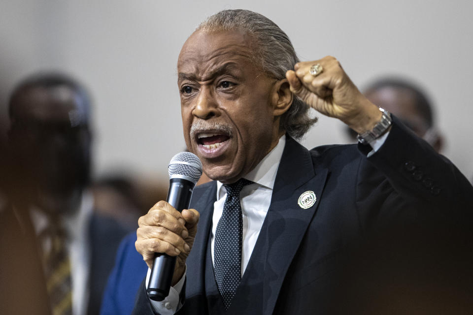 Rev. Al Sharpton speaks during the funeral for Patrick Lyoya at the Renaissance Church of God in Christ Family Life Center in Grand Rapids, Mich. on Friday, April 22, 2022. The Rev. Al Sharpton demanded that authorities publicly identify the Michigan officer who killed Patrick Lyoya, a Black man and native of Congo who was fatally shot in the back of the head after a struggle, saying at Lyoya's funeral Friday: “We want his name!" (Cory Morse/The Grand Rapids Press via AP)