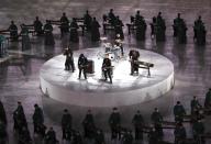 <p>Artists perform during the closing ceremony. REUTERS/Christian Hartmann </p>