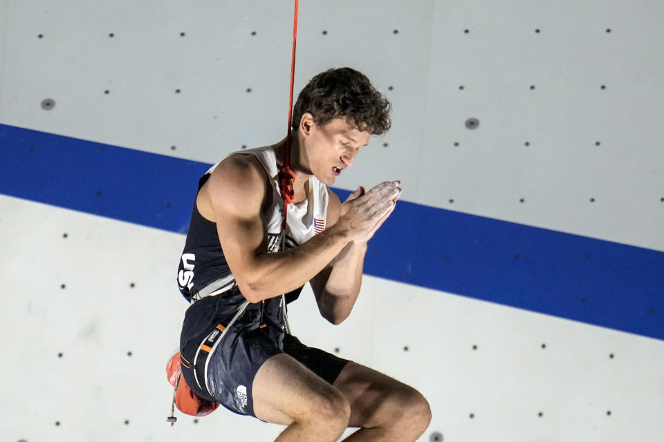 FILE - Nathaniel Coleman, of the United States, competes during the men's sport climbing lead final at the 2020 Summer Olympics on Aug. 5, 2021, in Tokyo, Japan. Sport climbing's popularity has risen in recent years as more climbers have turned out to scale walls indoor and out. (AP Photo/Gregory Bull, File)