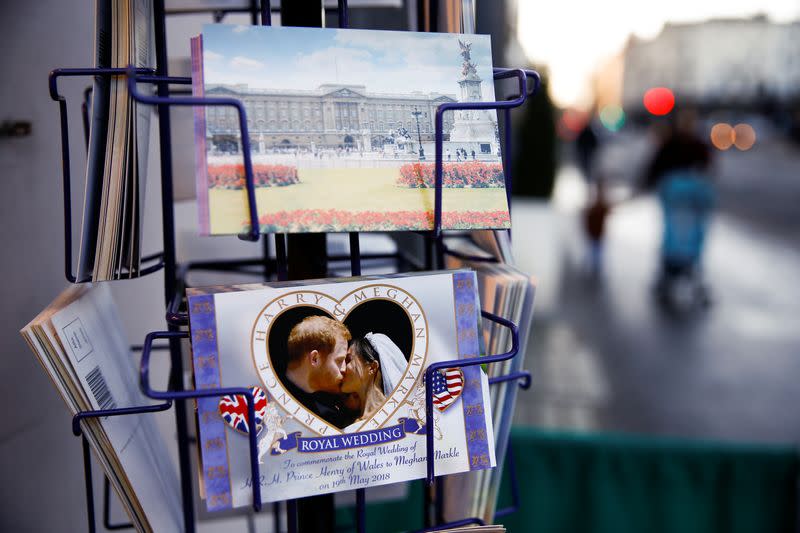 Merchandise depicting Britain's Prince Harry and Meghan, Duchess of Sussex, are seen on display in a souvenir shop near Buckingham Palace in London