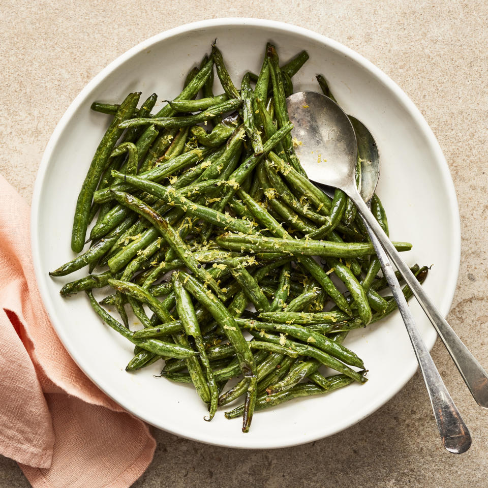 <p>These tender, charred air-fryer green beans have bright lemon flavor and subtle savory notes from garlic and pepper. If you like to roast your vegetables, the air fryer will do it for you in a snap. <a href="https://www.eatingwell.com/recipe/8010026/air-fryer-green-beans/" rel="nofollow noopener" target="_blank" data-ylk="slk:View Recipe;elm:context_link;itc:0;sec:content-canvas" class="link ">View Recipe</a></p>