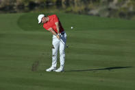 Rory McIlroy, of Northern Ireland, takes his second shot onto the 15th hole during the final round of the CJ Cup golf tournament, Sunday, Oct. 17, 2021, in Las Vegas. (AP Photo/David Becker)