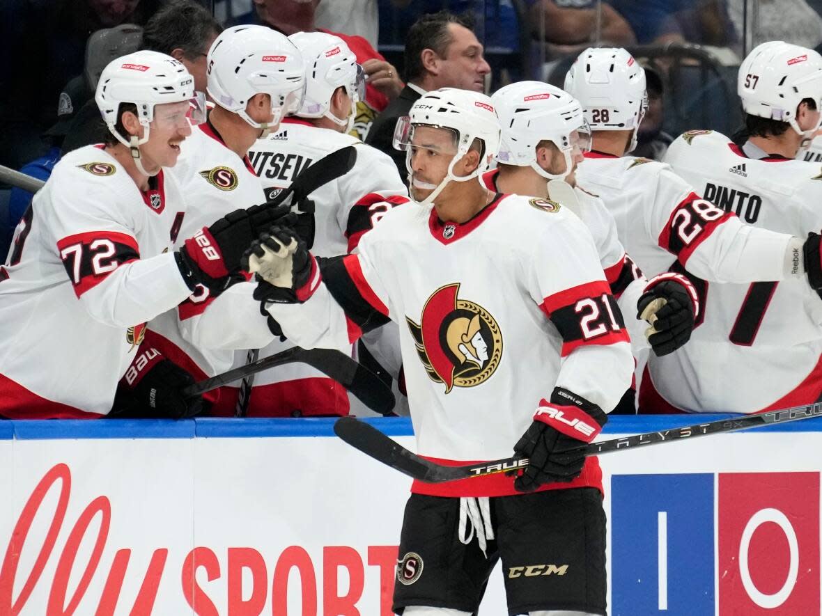 Ottawa Senators right wing Mathieu Joseph (21) celebrates with the bench after his goal against the Tampa Bay Lightning during the second period of an NHL hockey game Tuesday, Nov. 1, 2022, in Tampa, Fla. (Chris O'Meara/AP - image credit)