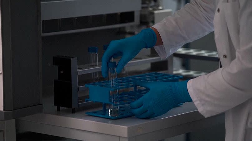 A scientist working through samples at the Max Planck Institute in Germany.