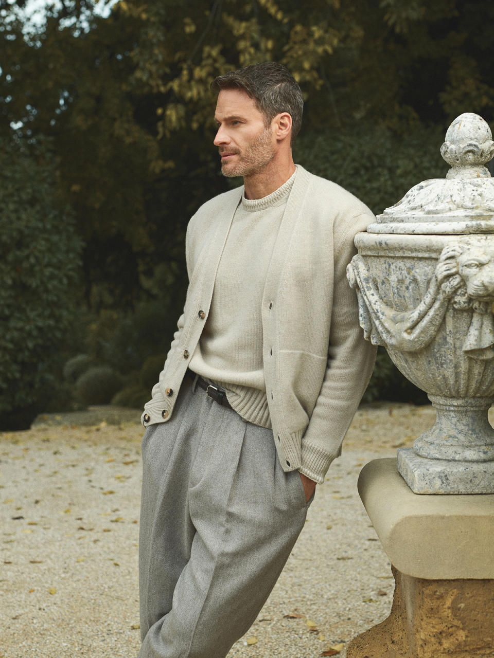 On him: Loro Piana baby cashmere cardigan, $4,750, sweater, $3,150, and wool, linen, and cashmere pants, $1,400; Giorgio Armani belt, $425.