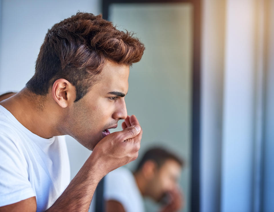 “Keto breath” aka ‘bad breath’ is one of the most <a href="https://www.healthline.com/health/keto-breath#treatment" rel="nofollow noopener" target="_blank" data-ylk="slk:common;elm:context_link;itc:0;sec:content-canvas" class="link ">common</a> side effects of the body being in ketosis. Image via Getty Images.