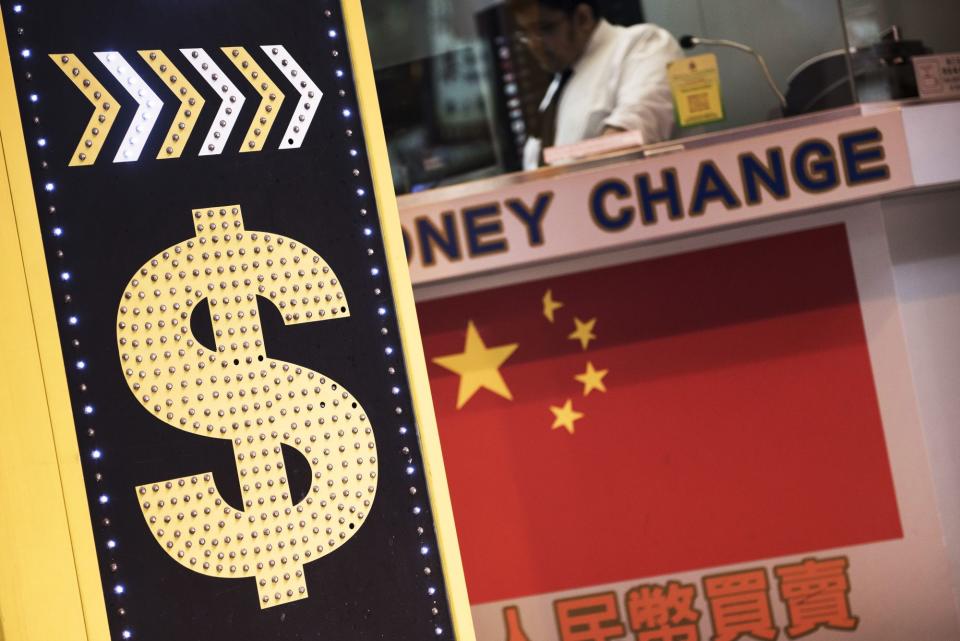 Dollar Intervention Risk Rises as Yuan Slump Stokes FX War Bets