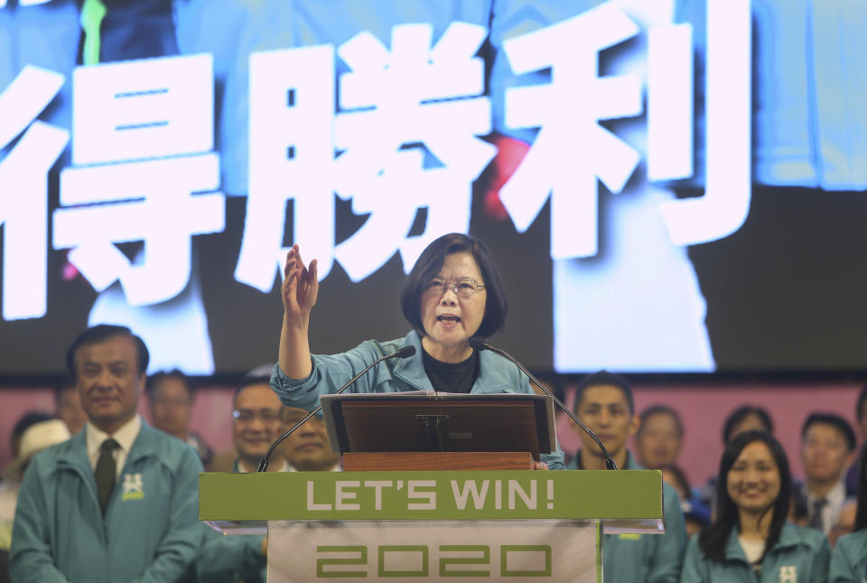 Taiwan President and Democratic Progressive Party presidential candidate Tsai Ing-wen delivers a speech as she launches her re-election campaign in Taipei, Taiwan, Sunday, Nov. 17, 2019. Taiwan will hold its presidential election on Jan. 11, 2020. (AP Photo/Chiang Ying-ying)