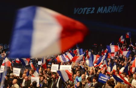 Supporters for Marine Le Pen, French National Front (FN) political party leader and candidate for French 2017 presidential election, attend a campaign rally in Nice, France, April 27, 2017. REUTERS/Jean-Pierre Amet