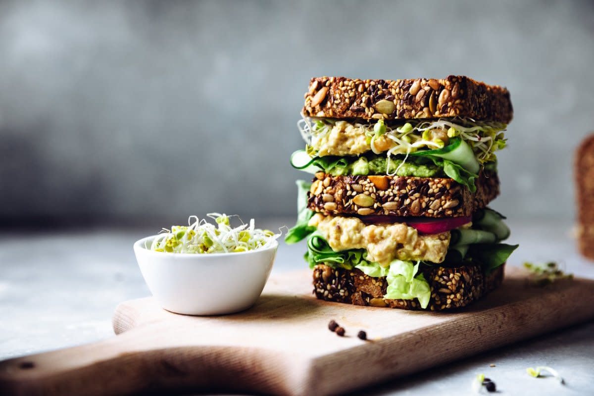 Stacked-up veggie sandwich on seeded bread. <p>iStock</p>