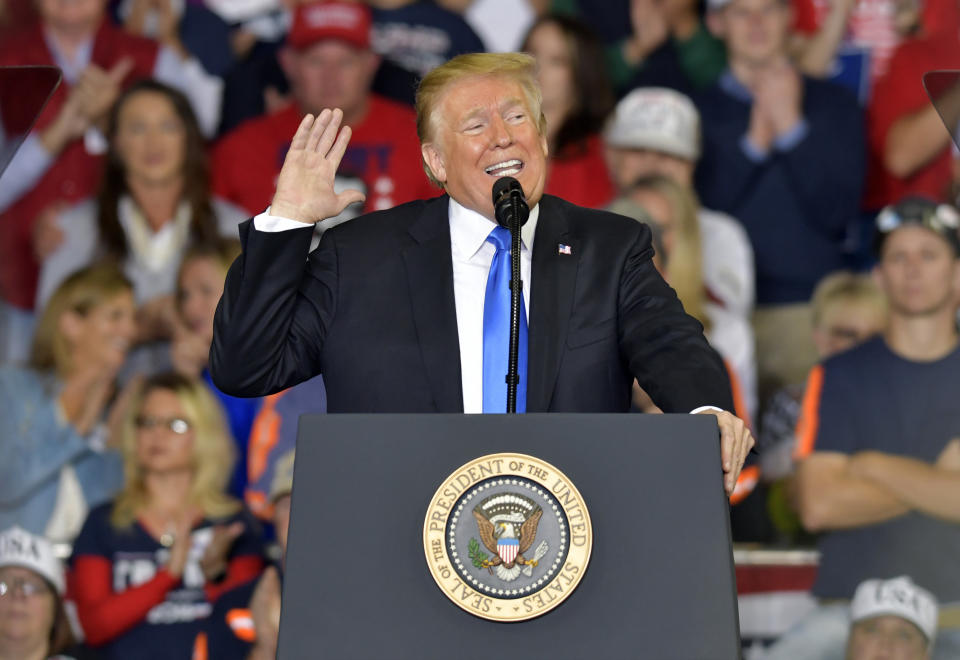 President Donald Trump speaks to a crowd at Eastern Kentucky University, Saturday, Oct. 13, 2018, in Richmond, Ky. (AP Photo/Timothy D. Easley)