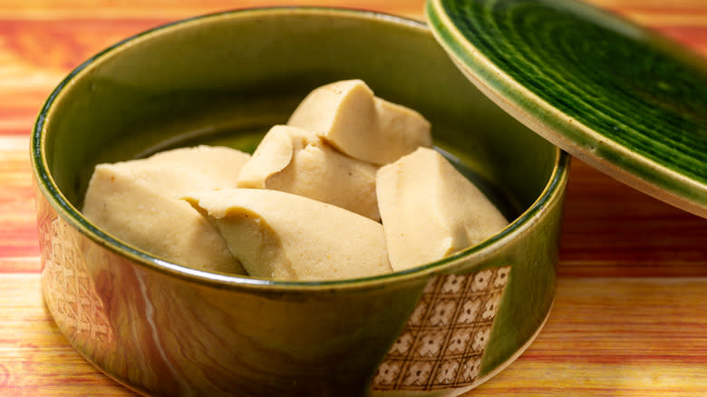 Tofu in a green bowl