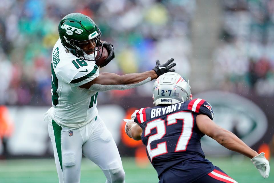 New York Jets wide receiver Randall Cobb (18) avoids a tackle by New England Patriots cornerback Myles Bryant (27) in the second half. The Jets lose to the Patriots, 15-10, at MetLife Stadium on Sunday, Sept. 24, 2023, in East Rutherford. (Danielle Parhizkaran/NorthJersey.com / USA TODAY NETWORK)