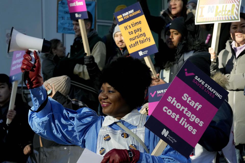 Nurses of the University College Hospital protest in London, Monday, Feb. 6, 2023. Tens of thousands of nurses and ambulance staff are walking off the job in the U.K. in what unions called the biggest strike in the history of the country's public health system. Monday's walkout is the latest in a wave of strikes that has disrupted Britons' lives for months as workers demand pay raises to keep pace with double-digit inflation. (AP Photo/Frank Augstein)