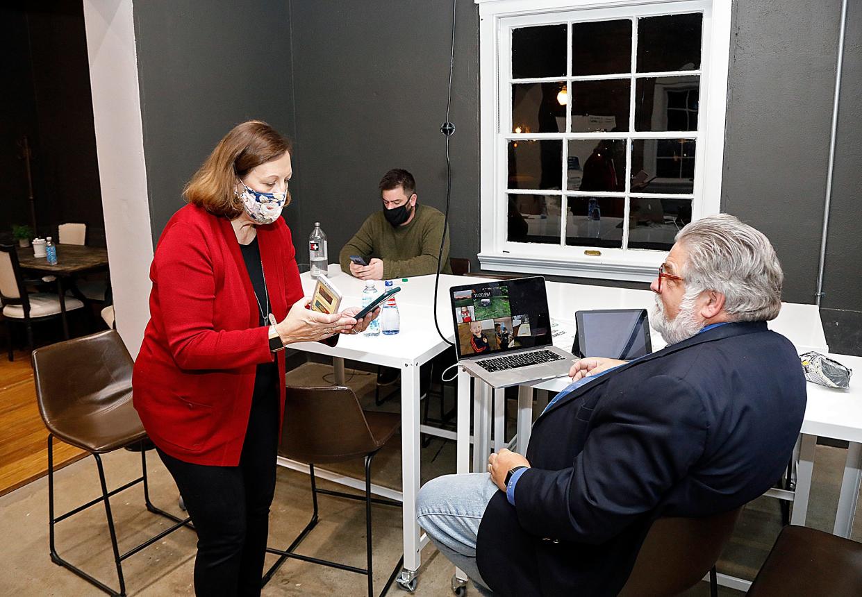 Democrat Jennifer Brunner read her husband Rick's phone saying that she is the projected winner at the Back Room in Worthington, Ohio on November 3, 2020. Brunner defeated Judith French for a seat on the Ohio Supreme Court.  