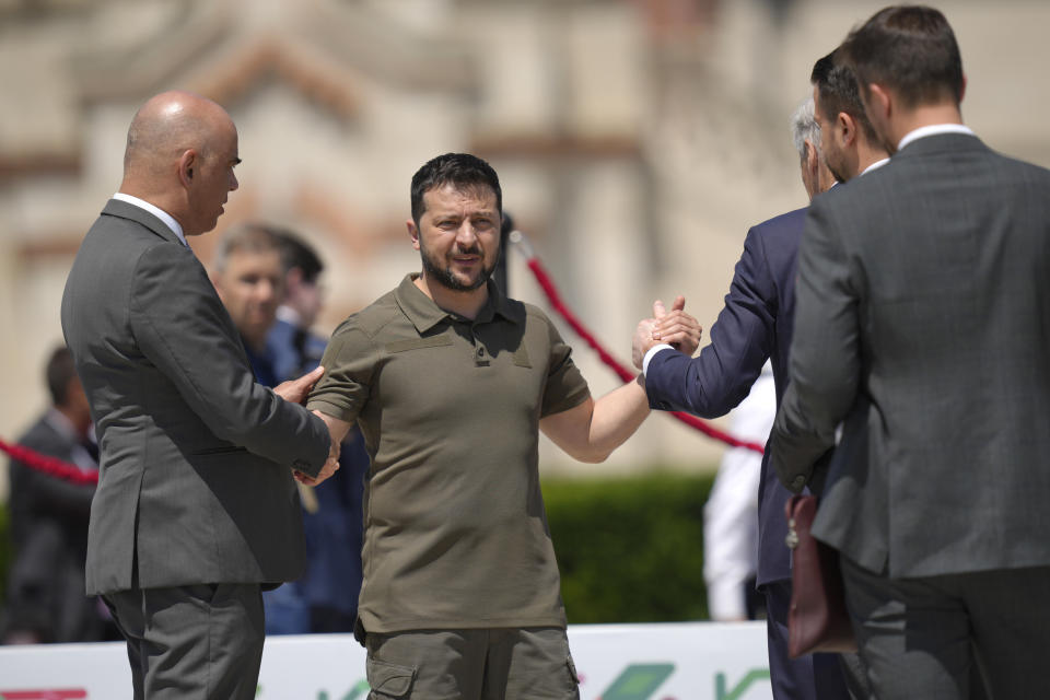 Ukraine's President Volodymyr Zelenskyy, center, shakes hands with Norway's Prime Minister Jonas Gahr Store, third right, during a group photo during the European Political Community Summit at the Mimi Castle in Bulboaca, Moldova, Thursday, June 1, 2023. Leaders are meeting in Moldova Thursday for a summit aiming to show a united front in the face of Russia's war in Ukraine and underscore support for the Eastern European country's ambitions to draw closer to the West and keep Moscow at bay. (AP Photo/Vadim Ghirda)