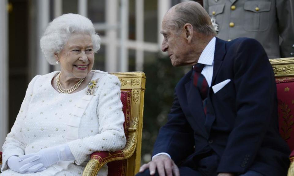 The Queen and the Duke of Edinburgh attend a garden party in Paris.