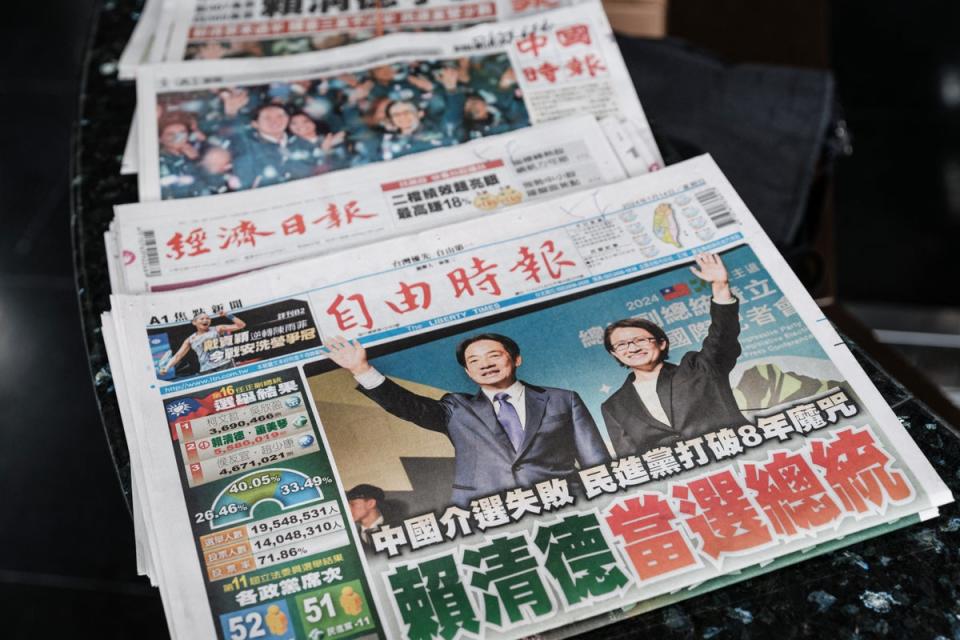 Local newspapers mark the ruling Democratic Progressive Party’s victory in the presidential election (AFP/Getty)