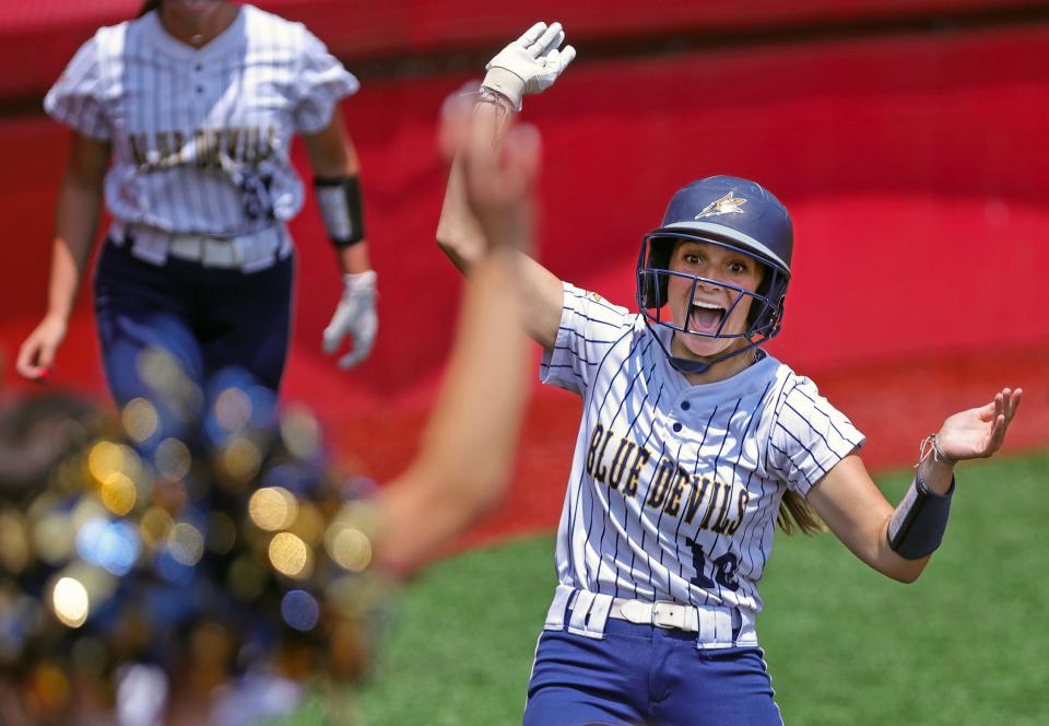 Tallmadge junior Sydney Becks celebrates after her inside-the-park home run in the fourth inning of the Division II state final against Canfield at Firestone Stadium, Saturday, June 3, 2023.