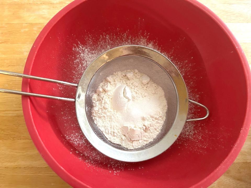 Sifting flour for Ina Garten's Outrageous Brownies