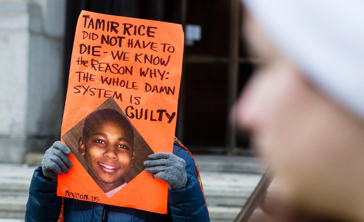An unidentified woman protests the death of 12-year-old Tamir Rice in Cleveland. (Photo: Angelo Merendino via Getty Images)