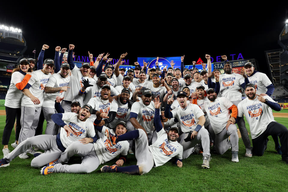 NEW YORK, NY - OCTOBER 23:   Members of the Houston Astros pose for a photo on the field after Astros defeated the New York Yankees in Game 4 of the ALCS at Yankee Stadium on Sunday, October 23, 2022 in New York, New York. (Photo by Mary DeCicco/MLB Photos via Getty Images)