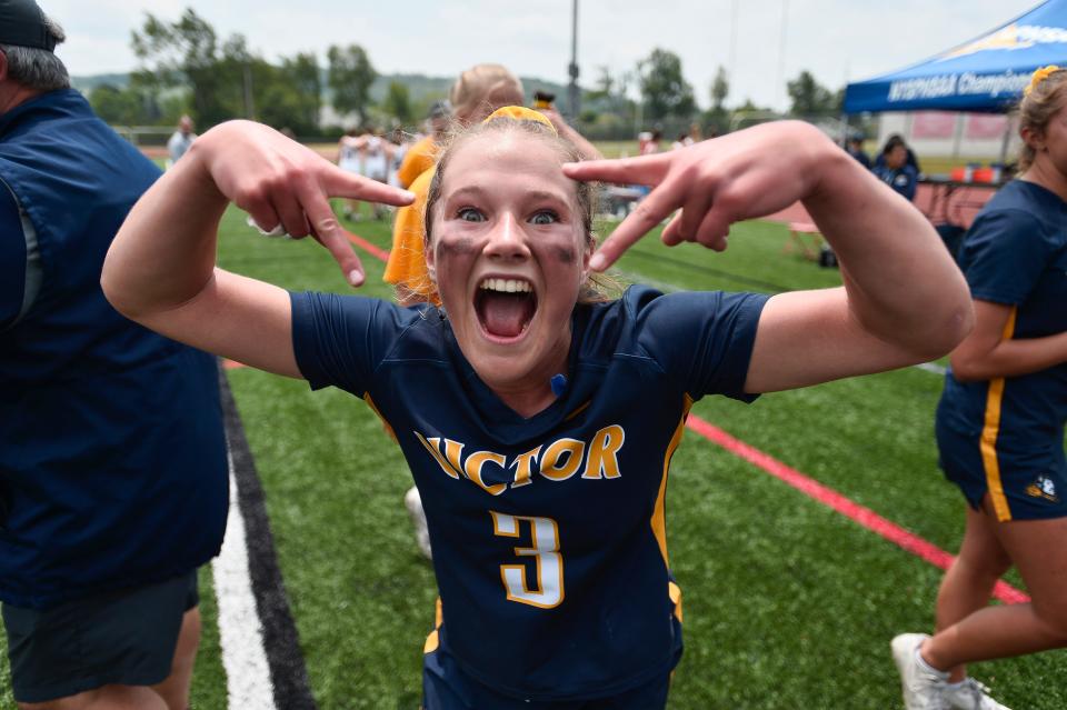 Victor's Brin Gotham celebrates the Blue Devils win in the NYSPHSAA Girls Lacrosse Championships Class B final in Cortland, N.Y., Saturday, June 10, 2023. Victor won the Class B title with an 8-6 win over Garden City.