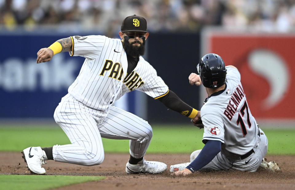 Cleveland Guardians' Will Brennan (17) is tagged out by San Diego Padres second baseman Rougned Odor on a stolen-base attempt during the third inning of a baseball game Wednesday, June 14, 2023, in San Diego. (AP Photo/Denis Poroy)