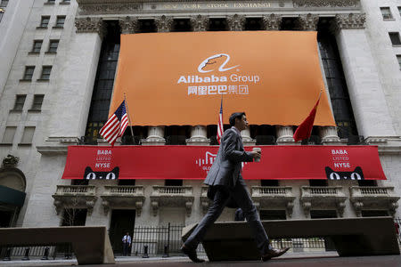 Signage for Alibaba Group Holding Ltd. covers the front facade of the New York Stock Exchange November 11, 2015. REUTERS/Brendan McDermid/File Photo