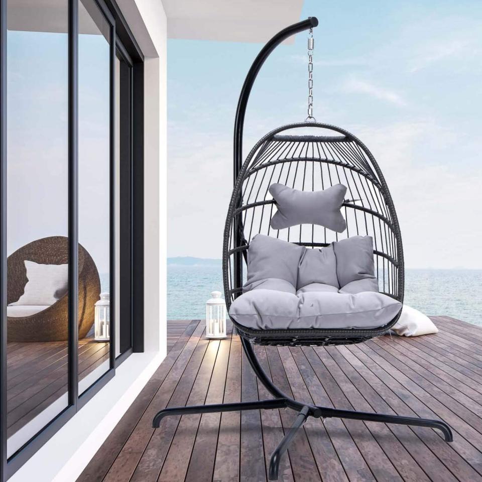 NICESOUL Indoor Outdoor Patio Wicker Hanging Chair. Image via Amazon.