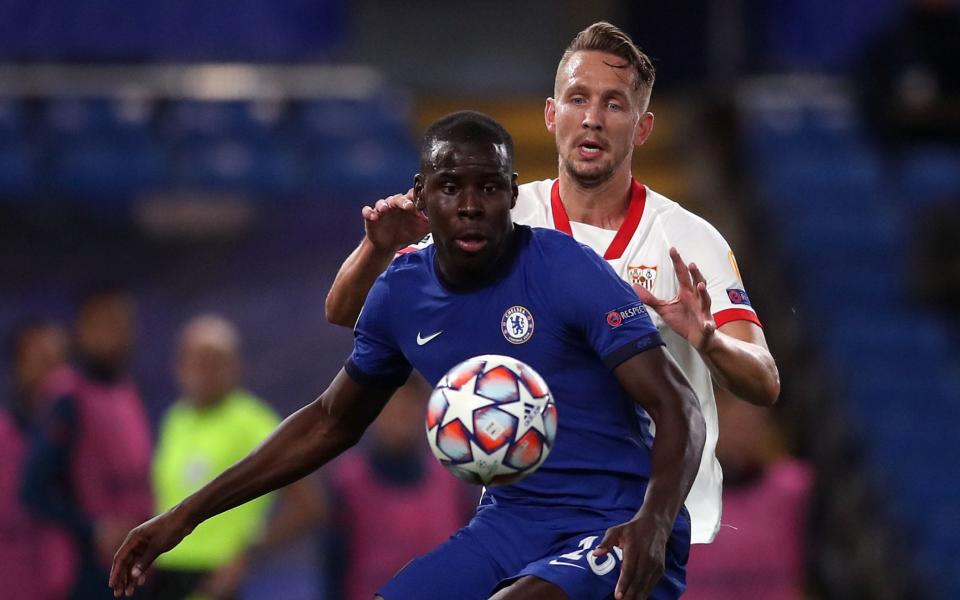 Kurt Zouma and Sevilla's Ivan Rakitic battle for the ball during the Champions League match at Stamford Bridge - PA