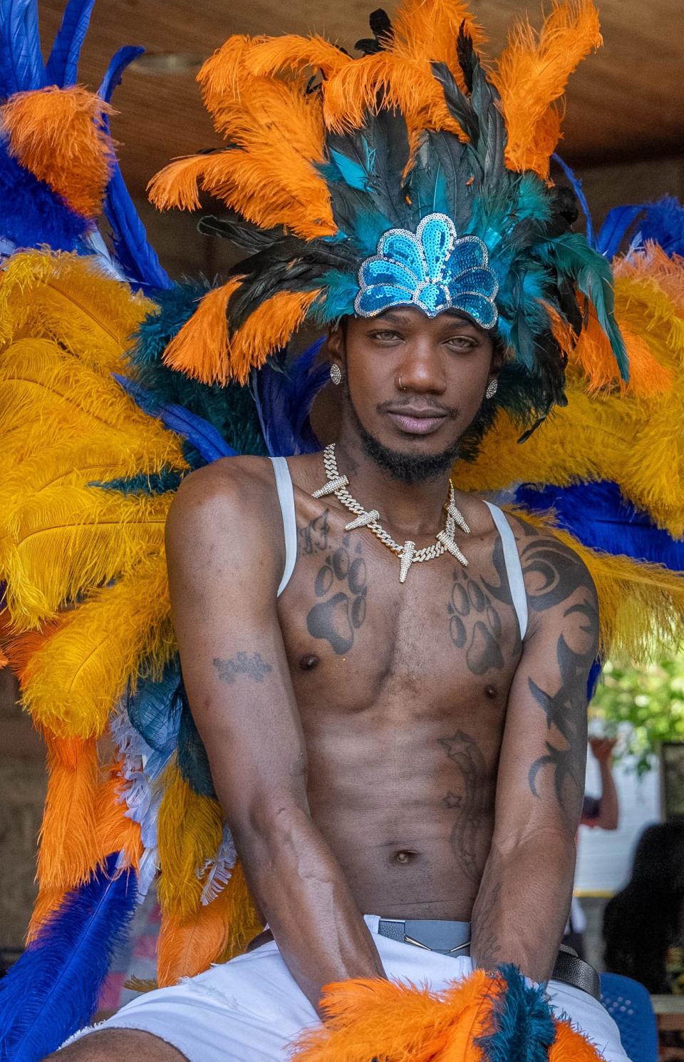 Dustyn Silk shows off his outfit that he made Saturday, June 10, 2023 during the Indy Pride Festival at Military Park in Indianapolis.