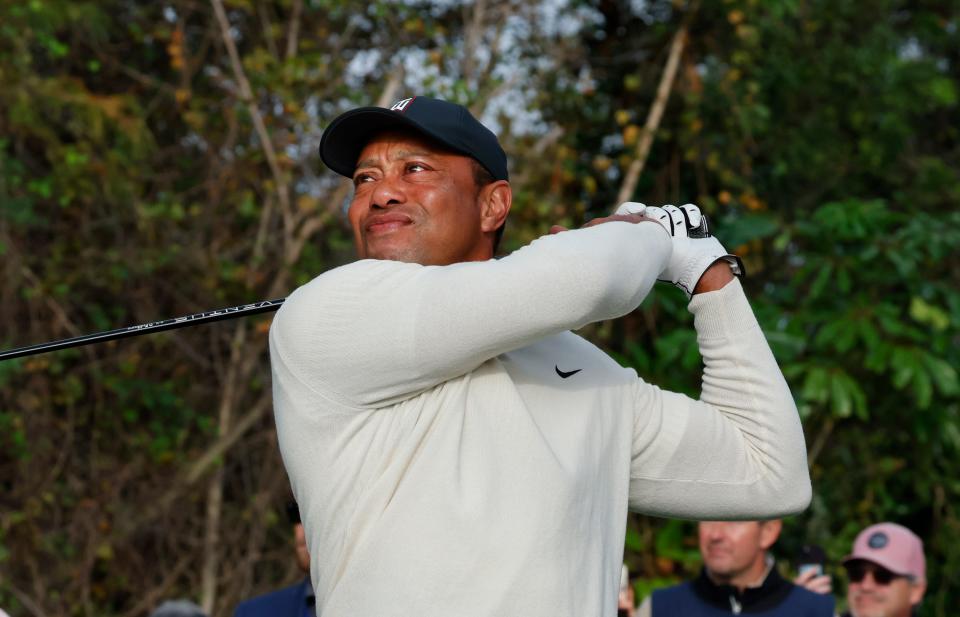 Tiger woods hits his tee shot on the first hole during a pro-am round of the 2022 PNC Championship on Friday.