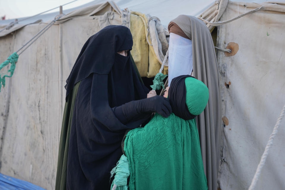 Shiite Muslims re-enact the seventh century battle of Karbala during activities marking the holy day of Ashoura, in the Shiite neighborhood of Sadr City, Baghdad, Iraq, Saturday, July 29, 2023. Ashoura is the annual Shiite Muslim commemoration marking the death of Imam Hussein, the grandson of the Prophet Muhammad, at the Battle of Karbala in present-day Iraq in the 7th century. (AP Photo/Hadi Mizban)