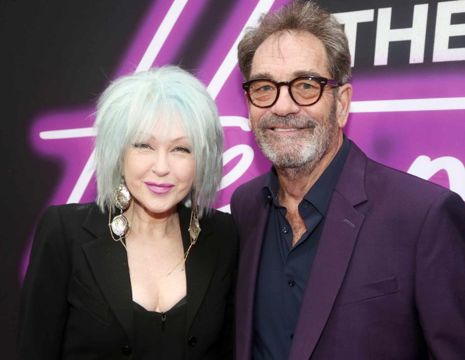 <p>Bruce Glikas/WireImage</p> Cyndi Lauper and Huey Lewis pose at the opening night celebration for the Huey Lewis & The News musical 