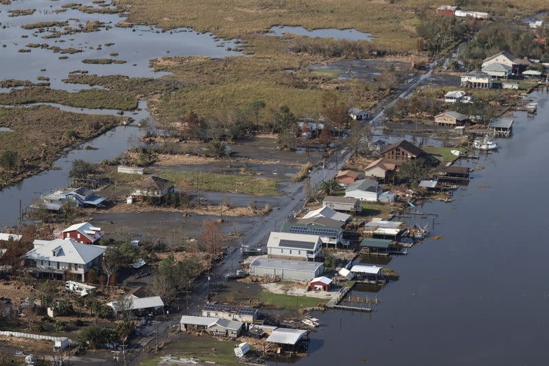 FILE PHOTO: U.S. President Biden inspects the damage from Hurricane Ida