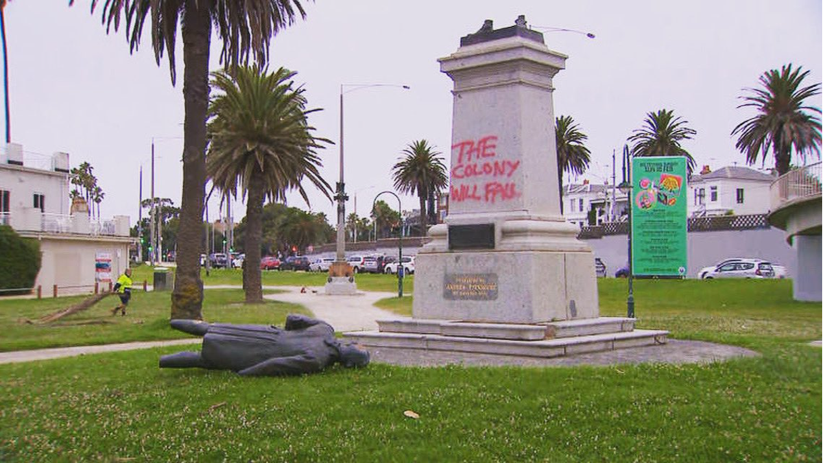 A Captain Cook statue in Melbourne has been sawn off at the ankles and the memorial vandalised