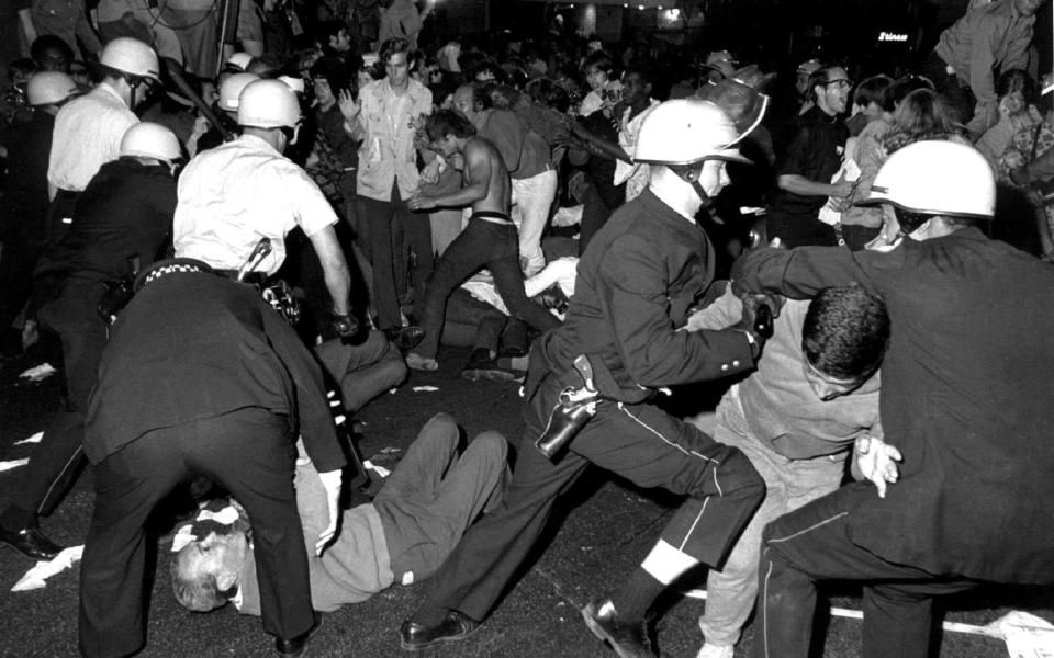 Police fight protesters on Michigan Avenue during the 1968 Democratic National Convention - Reuters