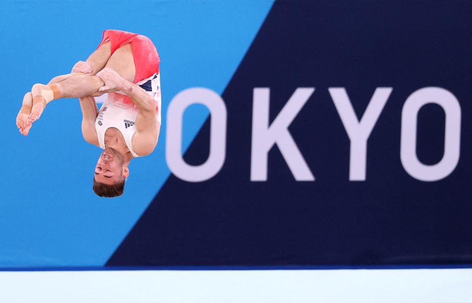 Giarnni Regini-Moran of Team Great Britain competes in the floor exercise during the Men's Team Final.