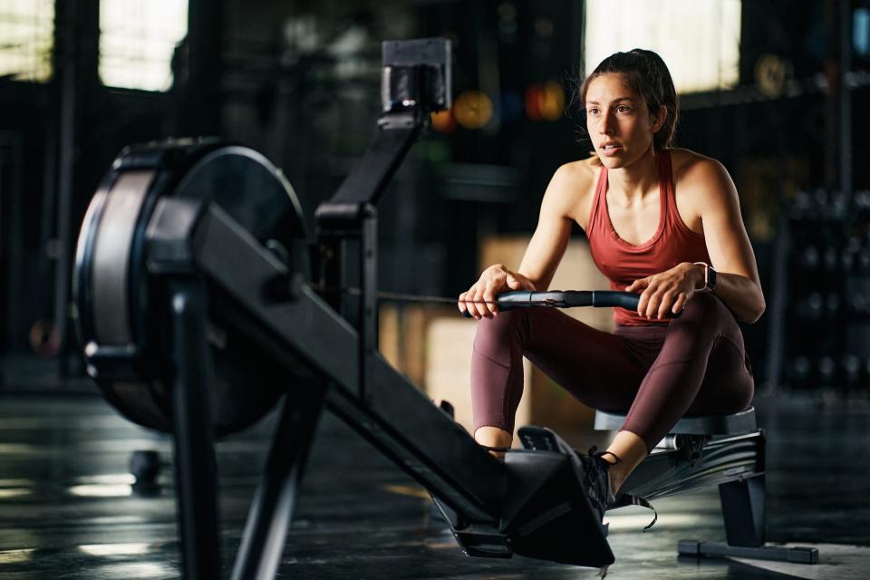 a woman on a rowing machine
